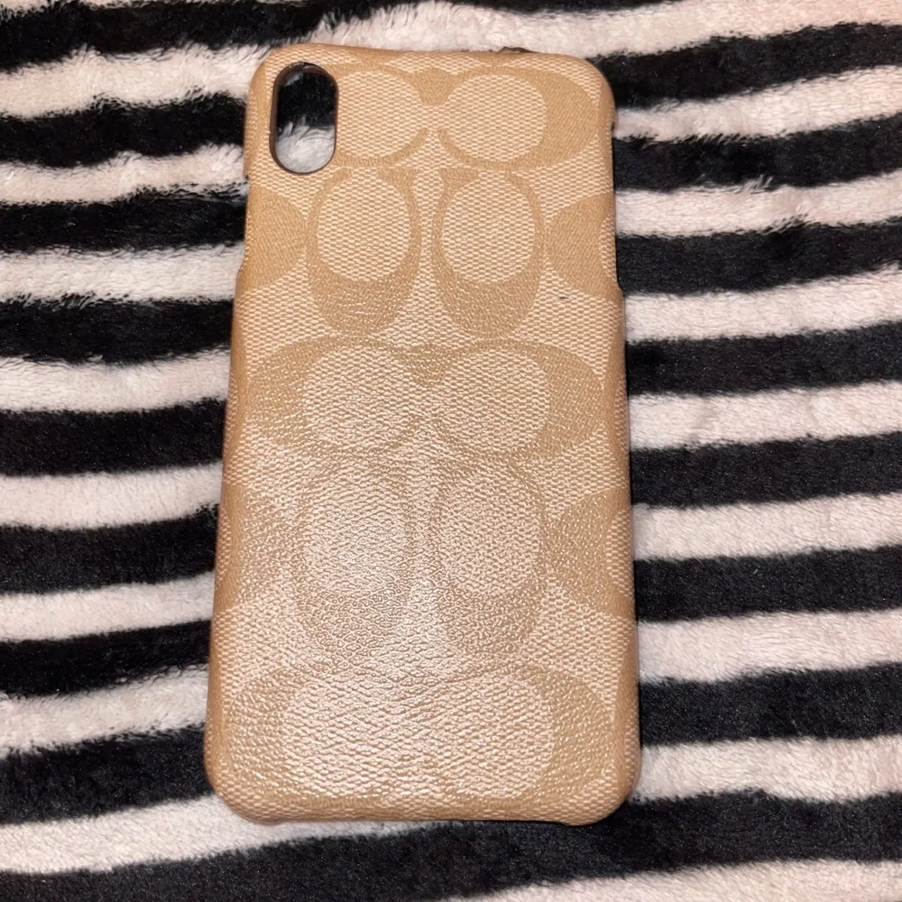 Coach AUTHENTIC phone case ( I forgot the generation dude )